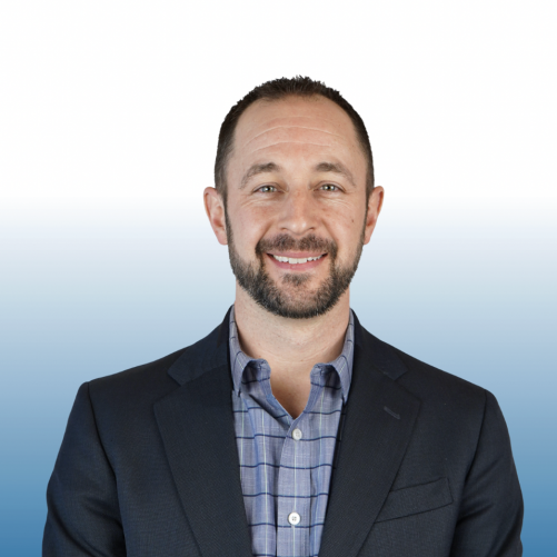 Professional headshot of an Equity commercial real estate team member smiling in a blazer