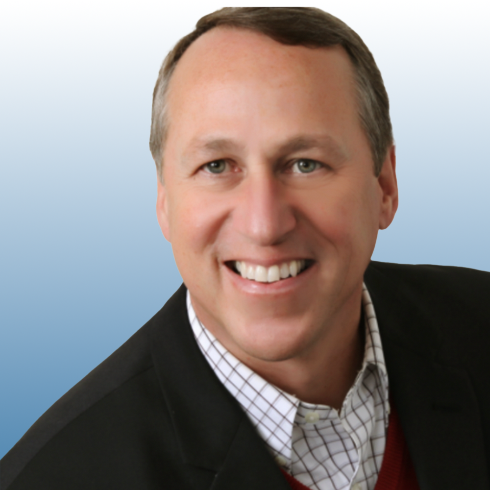 Scott Cubberly a smiling male Equity team member in black blazer, professional headshot