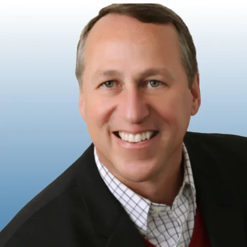 Scott Cubberly a smiling male Equity team member in black blazer, professional headshot